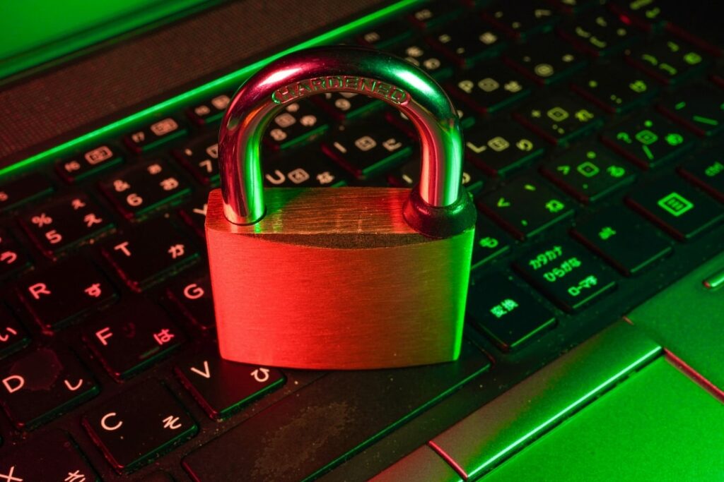 Photo of padlock sitting on top of black computer keyboard illustrating trade secret attorney services in Irvine, California.